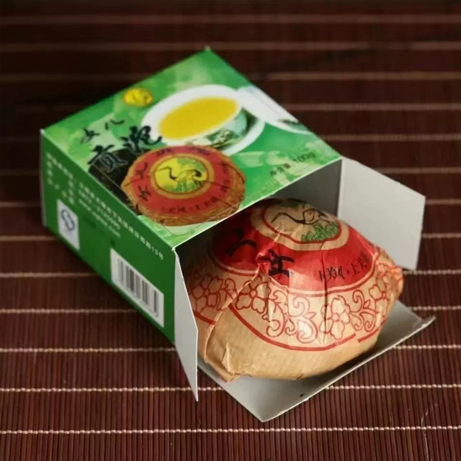 Thé Cru Xiaguan Tuocha de la Fille de la tribue de Chongyang – 100 grammes – 2010 - Lemeilleurthedechine