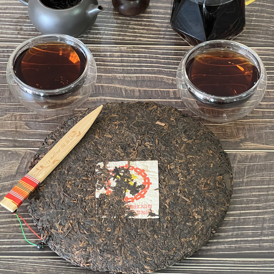 Galette timbre jaune thé Pu'erh Cuit – 357 g – 2006 - Lemeilleurthedechine