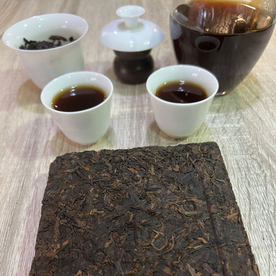 109 - Thés PUER Cuit brique carrée GONG XI FA CAI – Années 1990 – 250g - Lemeilleurthedechine