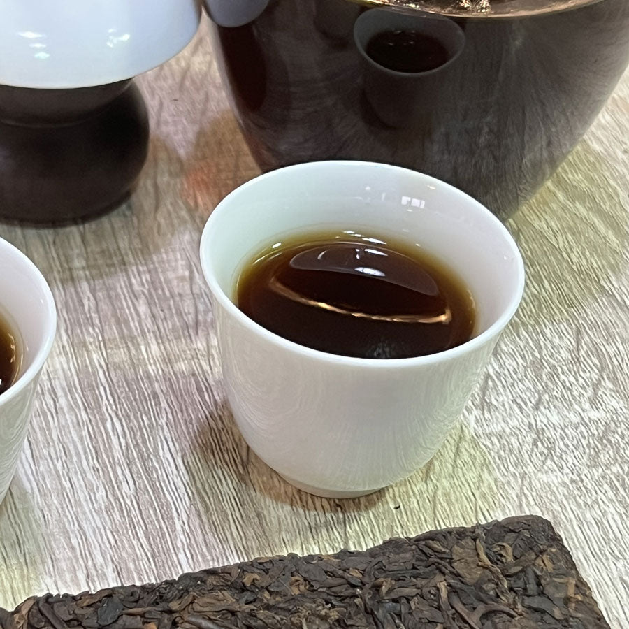109 - Thés PUER Cuit brique carrée GONG XI FA CAI – Années 1990 – 250g - Lemeilleurthedechine
