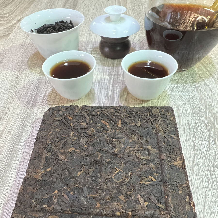 109 - Thés PUER Cuit brique carrée GONG XI FA CAI – Années 1990 – 250g - Lemeilleurthedechine