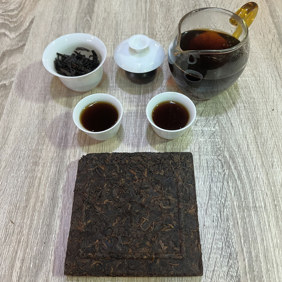 109 - Thés PUER Cuit brique carrée GONG XI FA CAI – Années 1990 – 250g - Lemeilleurthedechine